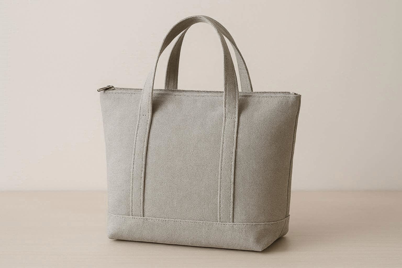 Gray Minimalist Canvas Tote Bag with Zipper Closure for Secure Storage - Image 1